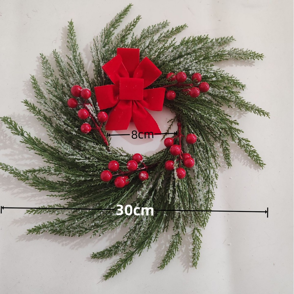 Amazon vende velas de Navidad Red Bow Guirnalda Navidad ventana puerta colgante Candelabro Guirnalda