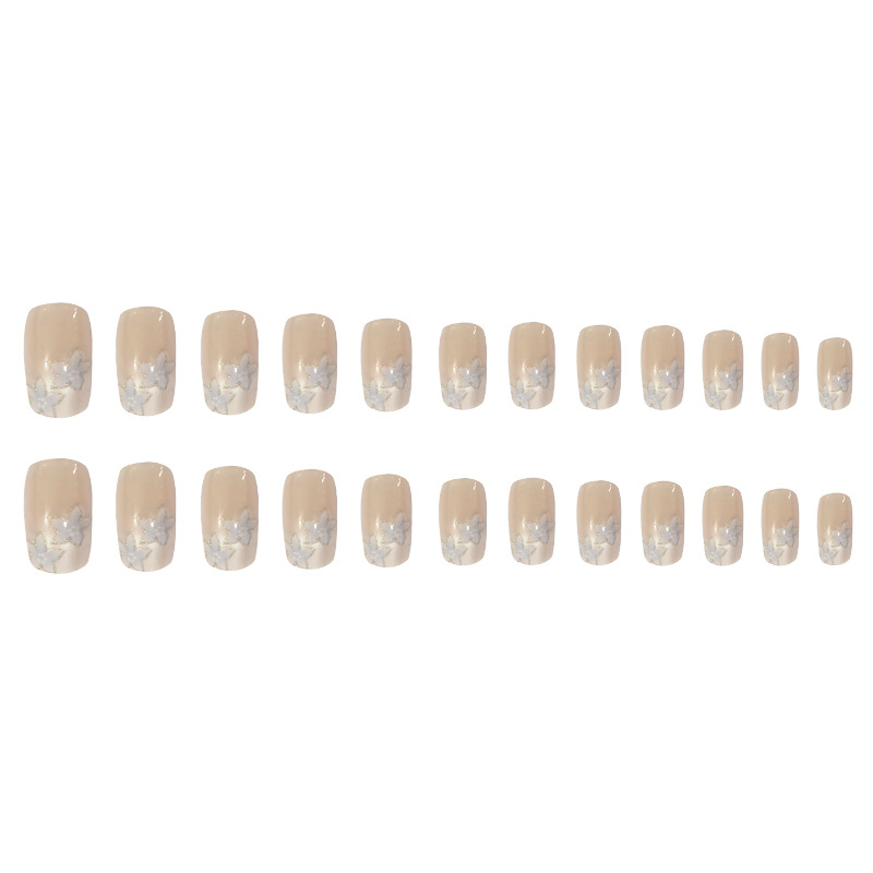 Desnudo, borde blanco, uñas francesas, flores azules, adornos dulces y exquisitos, 24 piezas de parches de uñas terminados.