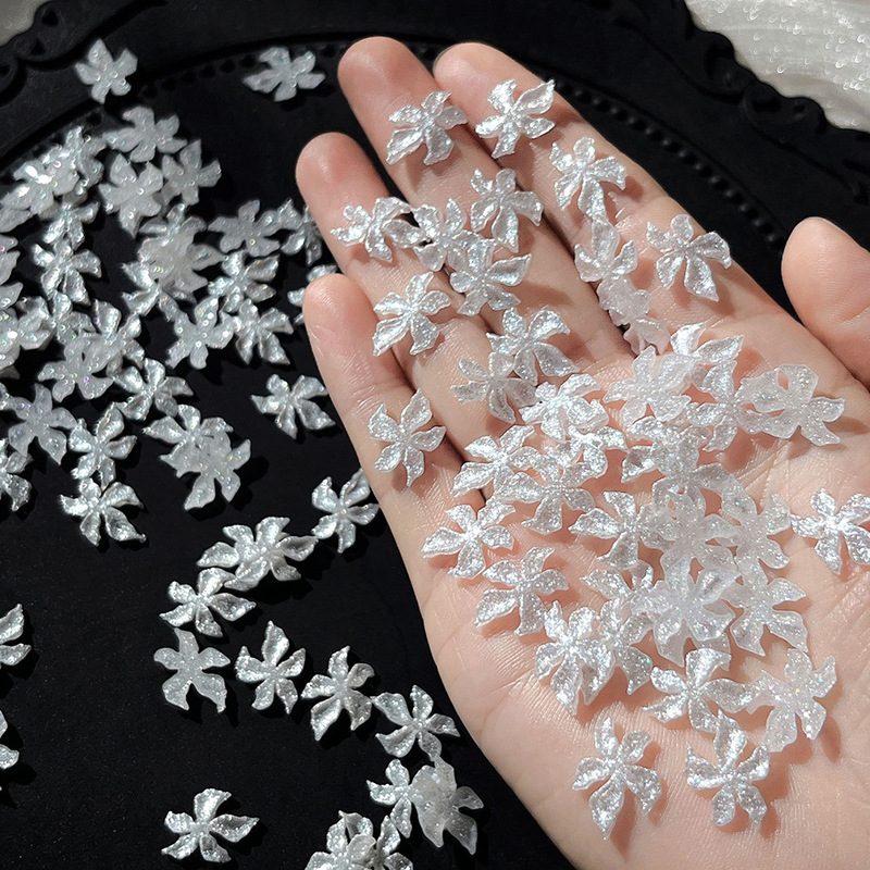 50 Pieces of Pearlescent White Five-Petal Flower Nail Art Decorations, Three-Dimensional Resin Lily Flowers, Light Luxury Nail Decoration Accessories Wholesale 50 Pieces of Pearlescent White Five-Petal Flower Nail Art Decorations, Three-Dimensional Resin Lily Flowers, Light Luxury Nail Decoration Accessories Wholesale