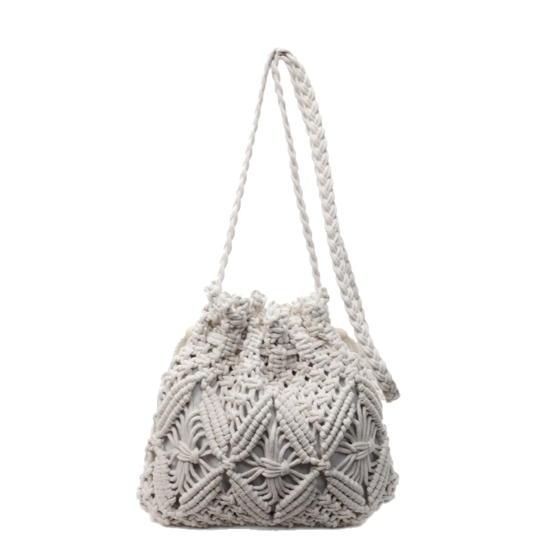 2025 verano nueva moda moda popular mochila de hombro de vacaciones de playa de viaje de playa bolsa de balde de tejido