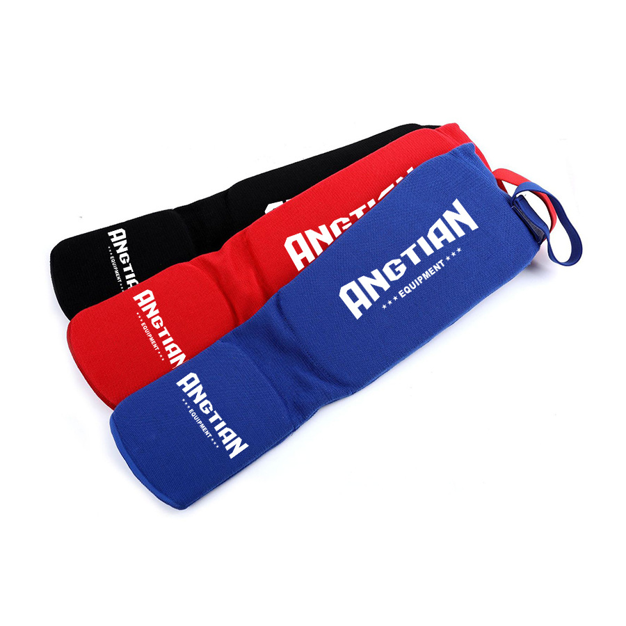 Fábrica Angtian personalizada de tejido para proteger las piernas de lucha Sanda Boxeo Muay Thai profesional para proteger las piernas