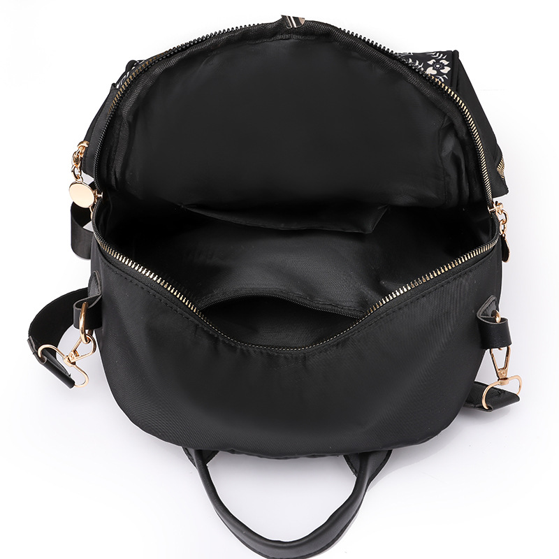 Bolsos para mujer 2023 nueva mochila de nylon para mujer coreana moda salvaje color de contraste mochila de viaje al aire libre al por mayor