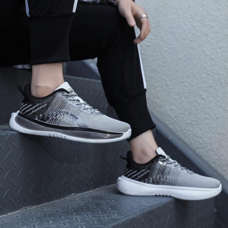 Zapatos de hombre casual todo-fósforo primavera y verano transpirable tejido volador zapatos deportivos de moda nuevos zapatos cómodos para correr casuales coreanos para jóvenes