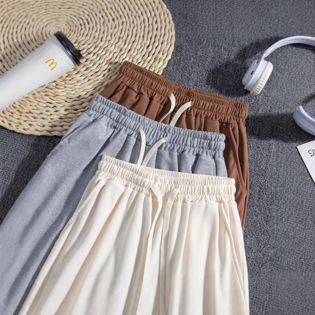 Hombre de verano casual holgado coreano waffle pantalon transpirable universal juvenil retro americano pantalones de cinco puntos