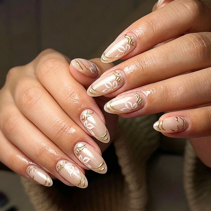 30 pieces of light luxury nude gold outline floral cat-eye press-on nails, available in various sizes, sourced from a popular nail art factory