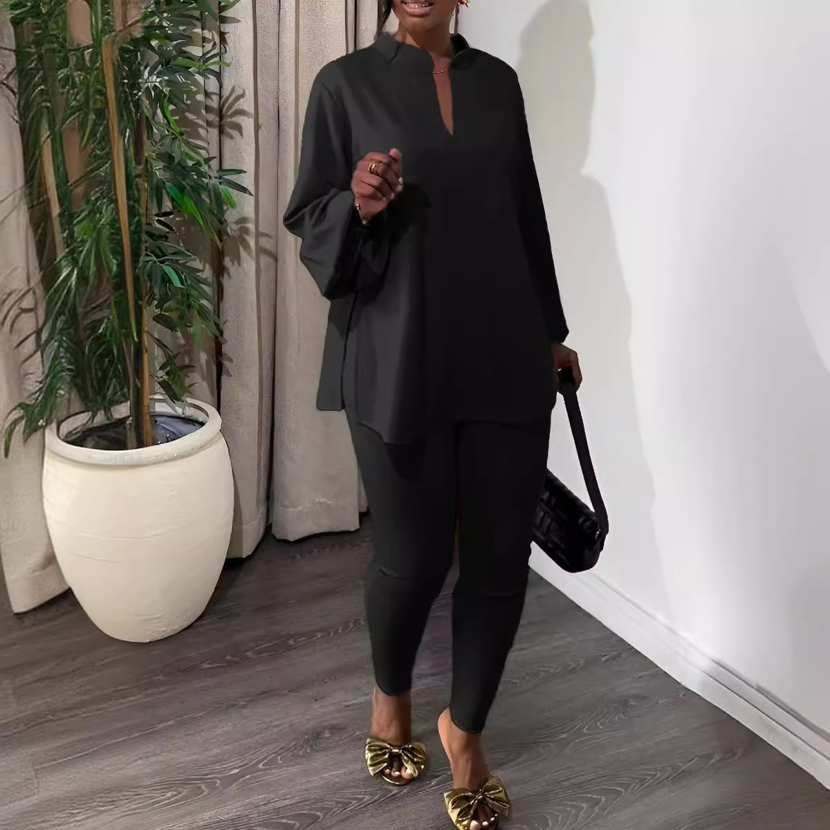 Conjunto de dos piezas de moda con pantalones ajustados y escote en V dividido de punto nuevo 2024_voghion.com