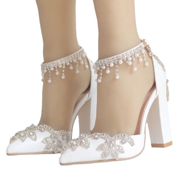 White wedding shoes pointed-toe with extremely high heels for bride