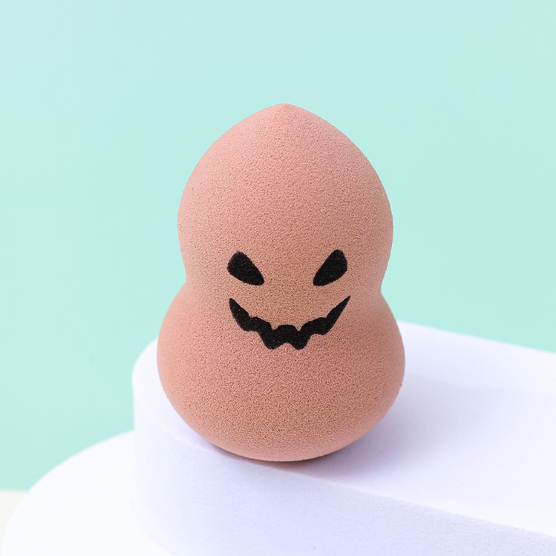 Fábrica personalizada transfronteriza de Halloween huevo de maquillaje polvo de fábrica personalizada gota de agua cortada oblicuamente huevo de esponja de maquillaje sin látex