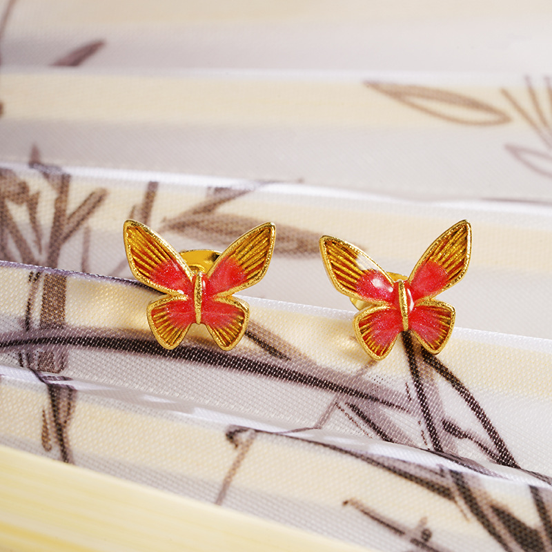 Nuevos productos vietnamitas arena lujosa ligera estilo de moda gradiente mariposa pernos de orejas nicho no se desvanecerá el diseño de joyas al por mayor