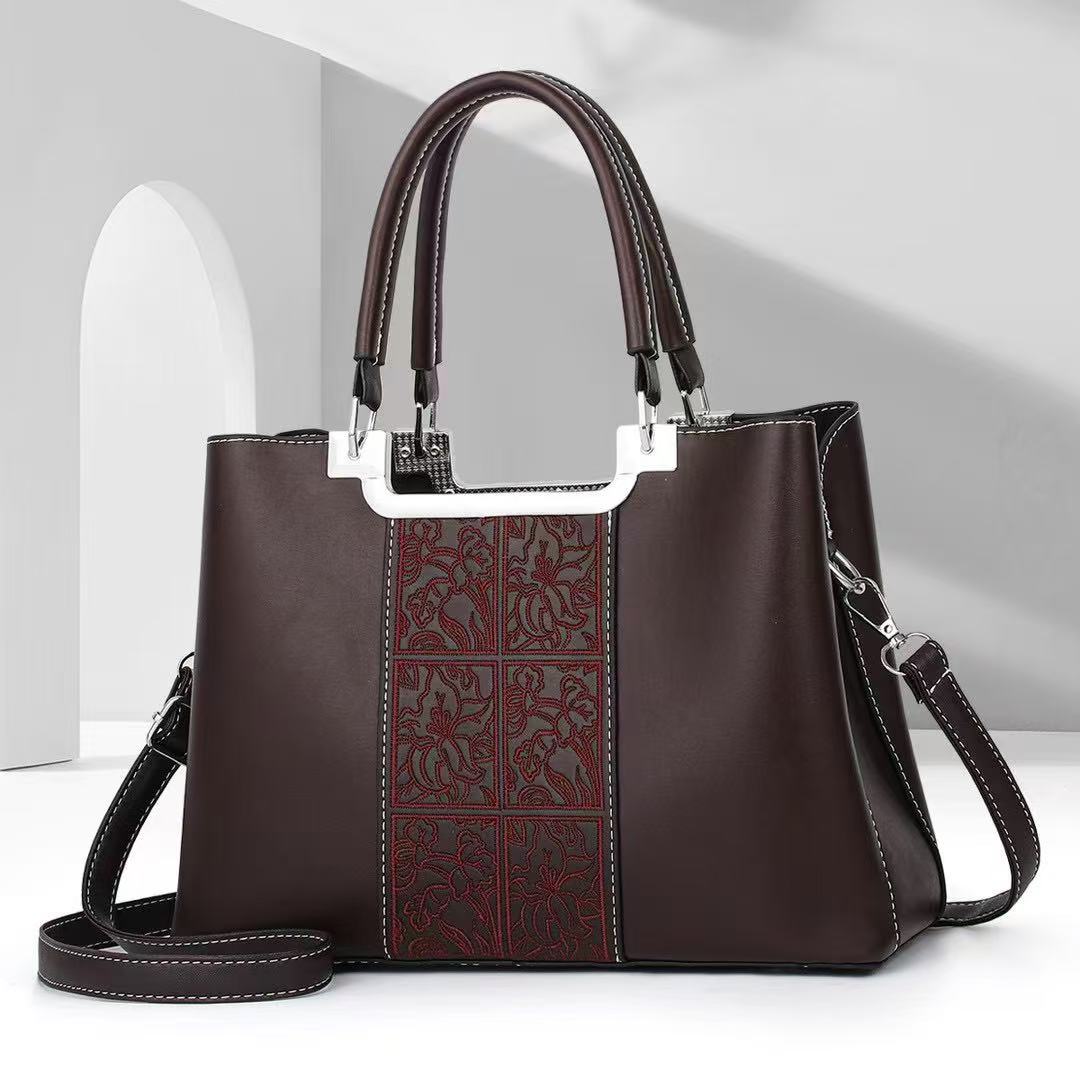 Bolso de madre atmosférico bolso de mujer simple de gran capacidad bolso de mensajero de hombro estilo explosivo bolso de marca de moda 2025