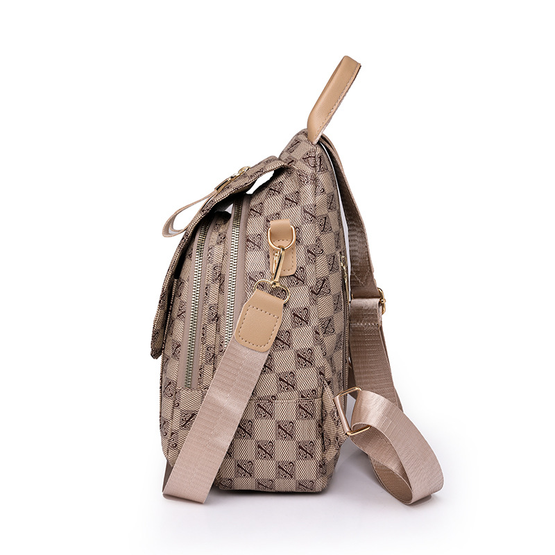 Comercio exterior al por mayor 2023 nueva mochila de cuero suave para mujer a cuadros moda contraste color viajes al aire libre mochila marea