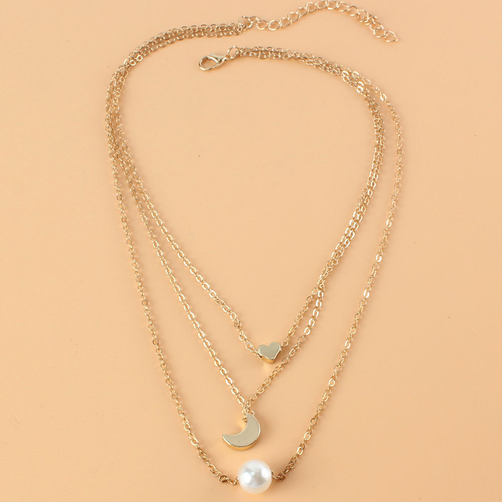 European And American Fashion Alloy Star Moon Pearl Pendant Necklace Jewelry Wholesale display picture 2