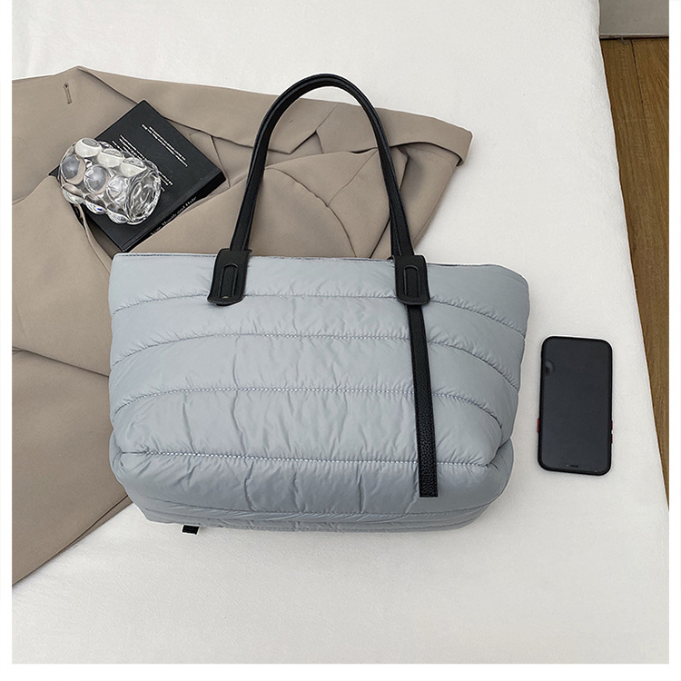 Große Kapazität Cross-Border Baumwoll-Steppjacken-Tasche modische vielseitige leichte Tragetasche Weltraum-Baumwoll-Freizeit-Pendelrucksack Umhängetasche Handtasche