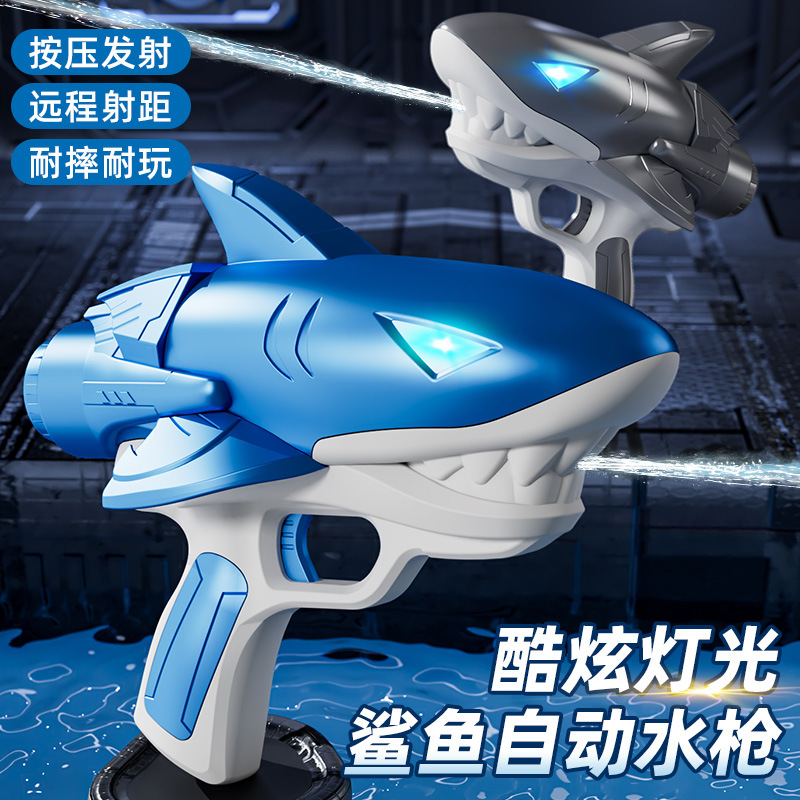 Nuevo tiburón eléctrico transfronterizo pistola de agua totalmente automática con luz de fuego para niños jugando con agua de verano juguetes de pistola de agua