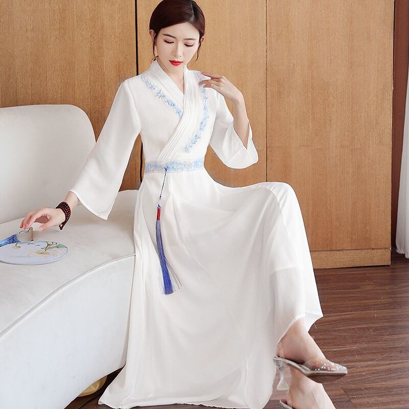 Zen-style women's spring and autumn white tea ceremony dress, embroidered, fitted, with a cinched waist, featuring Han elements and a Chinese aesthetic Zen-style women's spring and autumn white tea ceremony dress, embroidered, fitted, with a cinched waist, featuring Han elements and a Chinese aesthetic