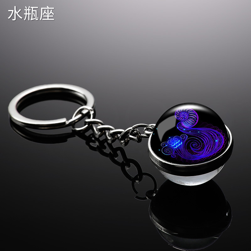 Transfronterizo 12 constelaciones de luz nocturna bolsos colgantes de bolsas de joyas de tiempo doble cara bola de vidrio llavero al por mayor