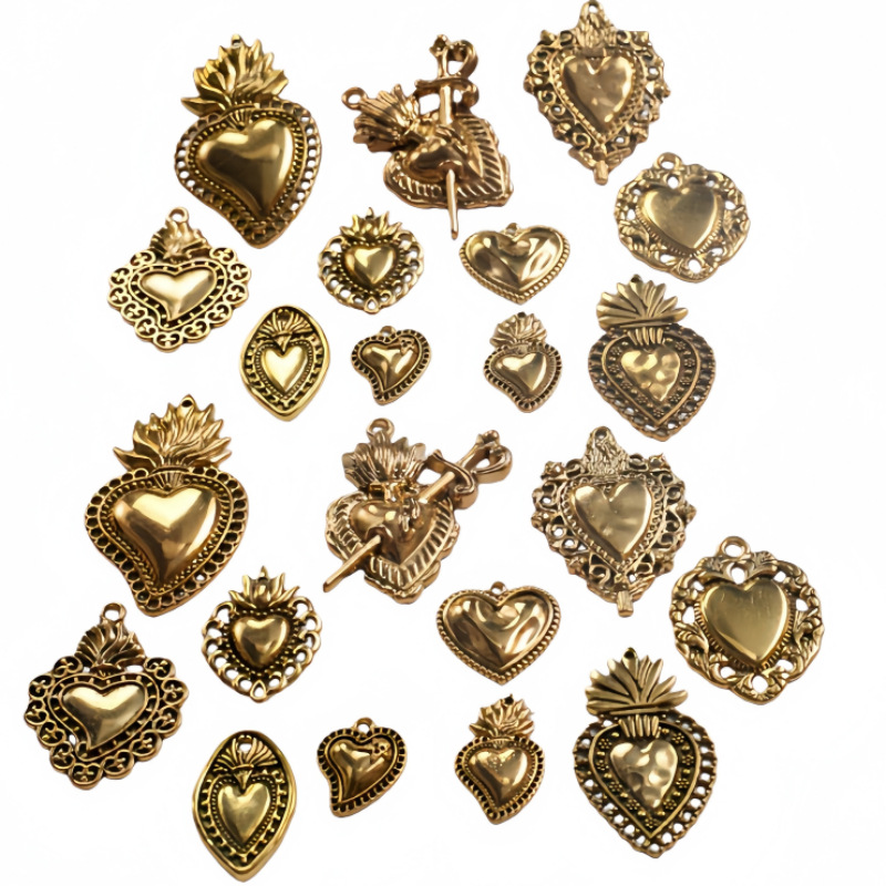 Transfronterizos 10 estilos de oro antiguo colorado colgante de aleación del corazón sagrado DIY encanto joyería accesorios metálicos