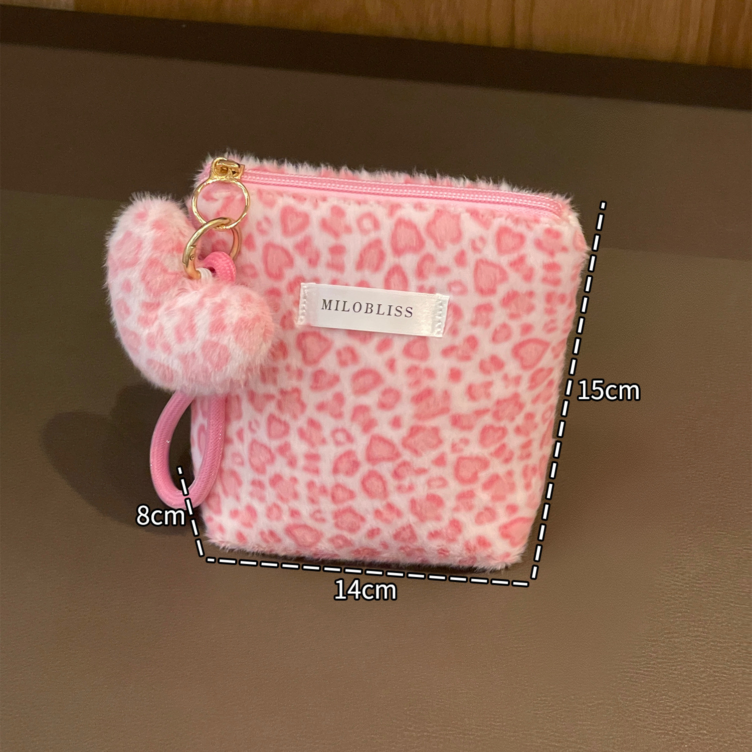 Nueva bolsa de maquillaje impresa de leopardo de peluche de pelo de conejo multifuncional portátil otoño y invierno para salir bolsa de almacenamiento de lavado de gran capacidad