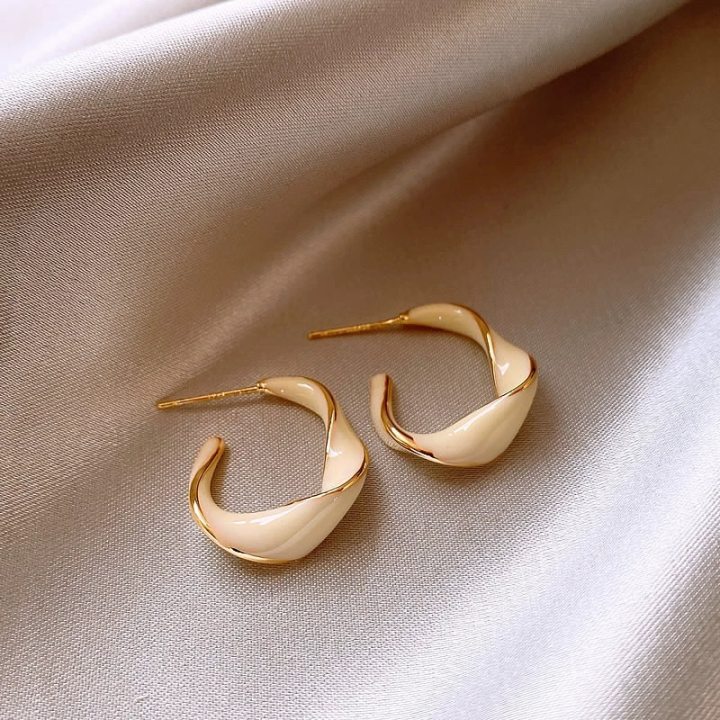 49 # White twist earrings