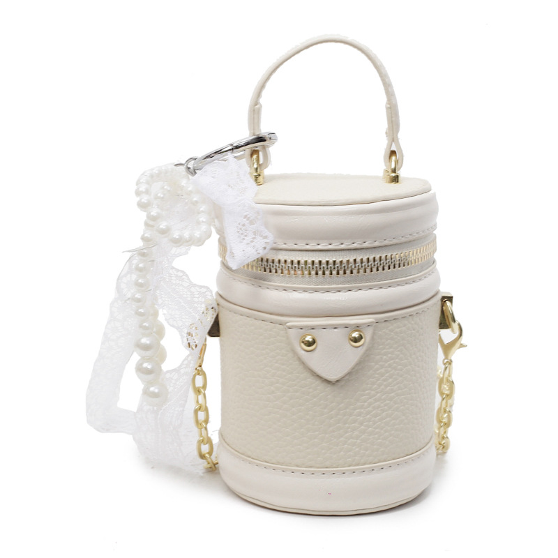 Transfronterizo de alta calidad moda mini bolso de cubo portátil para mujeres 2025 nuevo nicho de diseño universal mochila de hombro