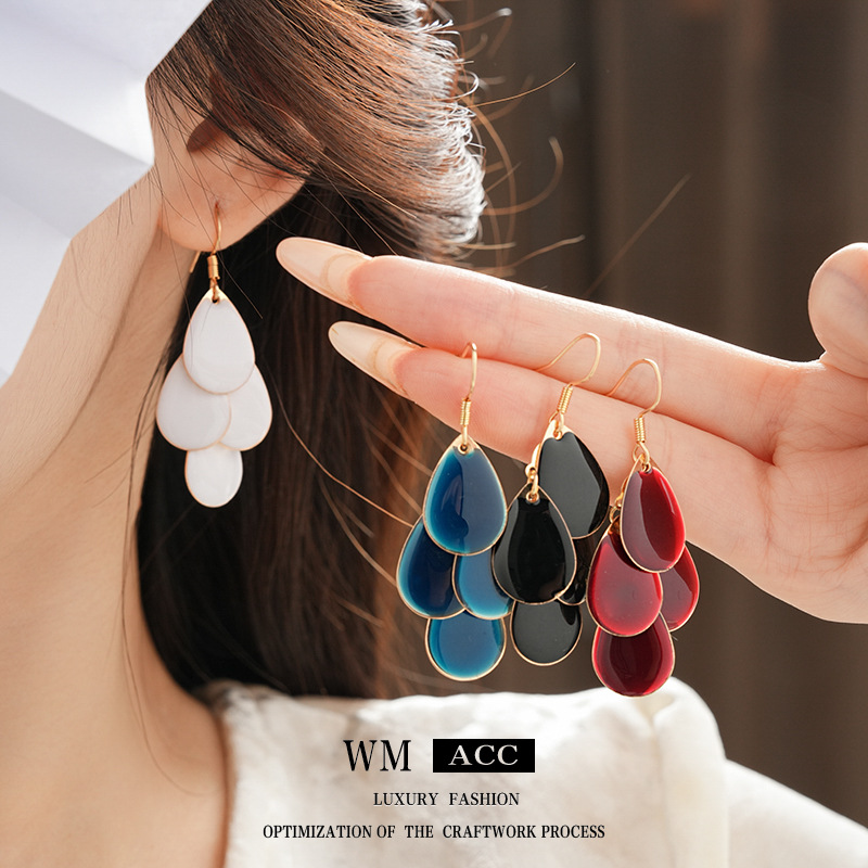 Gotas de agua de color sólido, escamas, borlas, ganchos para las orejas, pendientes largos de alta gama europeos y americanos, tendencia de la moda, pendientes creativos, mujeres