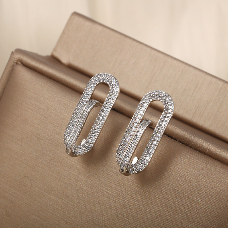 Xuping joyas geométricas elípticas micro incrustadas con orejetos de zircón, nicho de alto nivel, orejetos transfronterizos europeos y estadounidenses, orejetos para mujeres