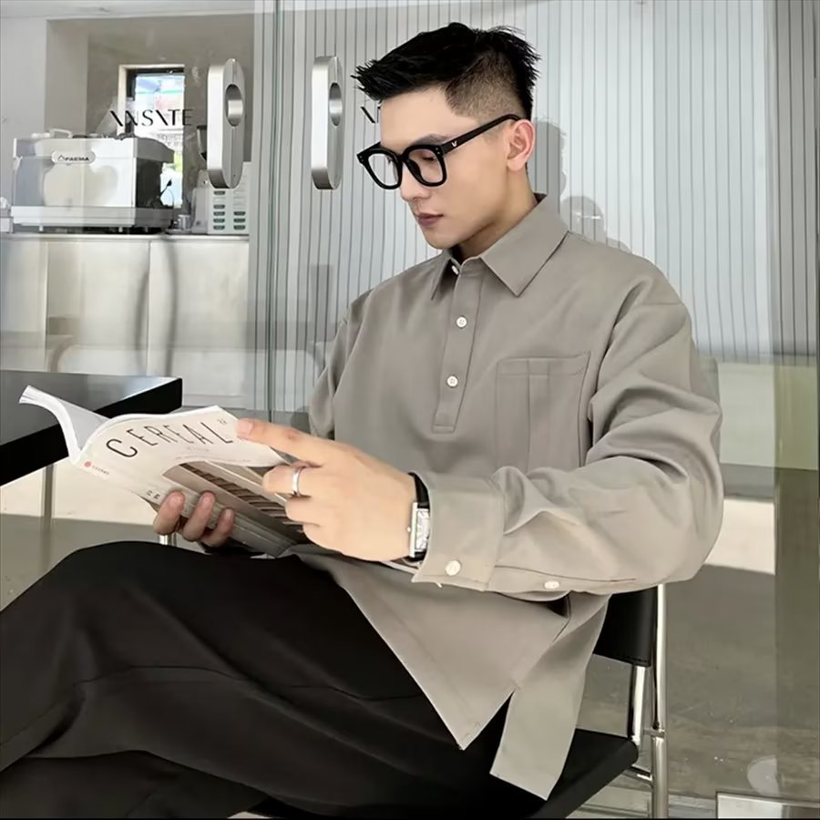 2024 marca de moda estilo universitario camisa polo de manga larga a juego de color tendencia de la moda masculina suéter de media cremallera suelto retro americano