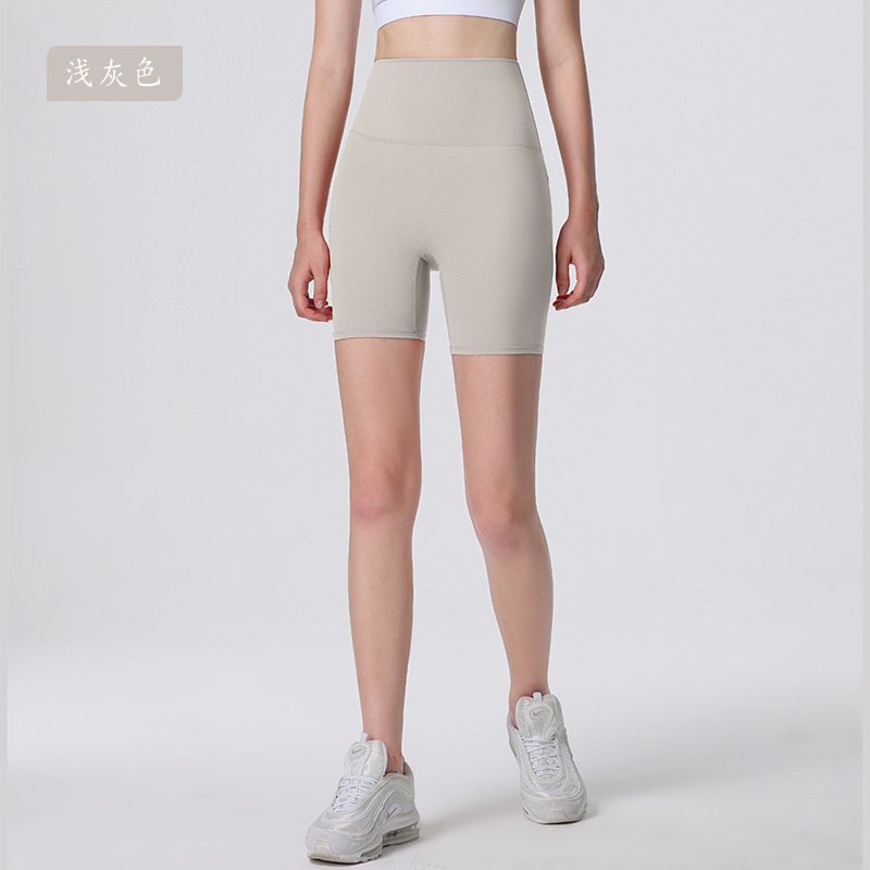 Nuevos deportes de Yoga de cintura alta desnuda sensación de no vergüenza línea de piel-friendly cadera levantamiento vientre contratación no caída de la aptitud de las mujeres de tres puntos cortos