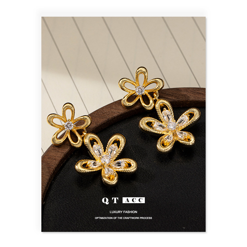 Moda europea y americana de alta calidad delicada pernos de flor incrustados con zircon otoño y invierno nuevo temperamento simple y versátil para mujeres