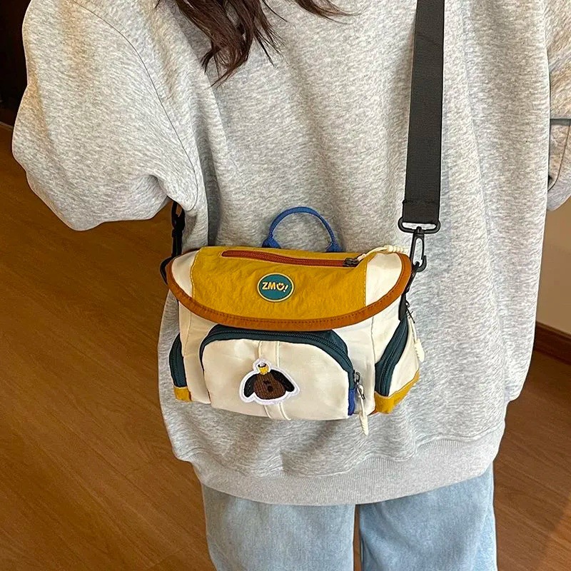 New color-blocked camera bag, single-shoulder multifunctional casual commuter small bag, crossbody bag, photography bag, lightweight storage bag