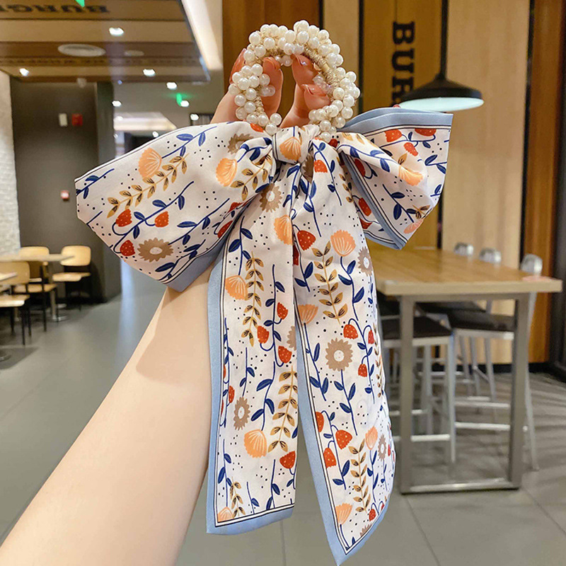 Banda de pelo de bufanda de seda corbata de pelo femenina Shixi Cinta de lazo de perla sale todo partido cuerda de cabeza Shixi 2021 cabello nuevo