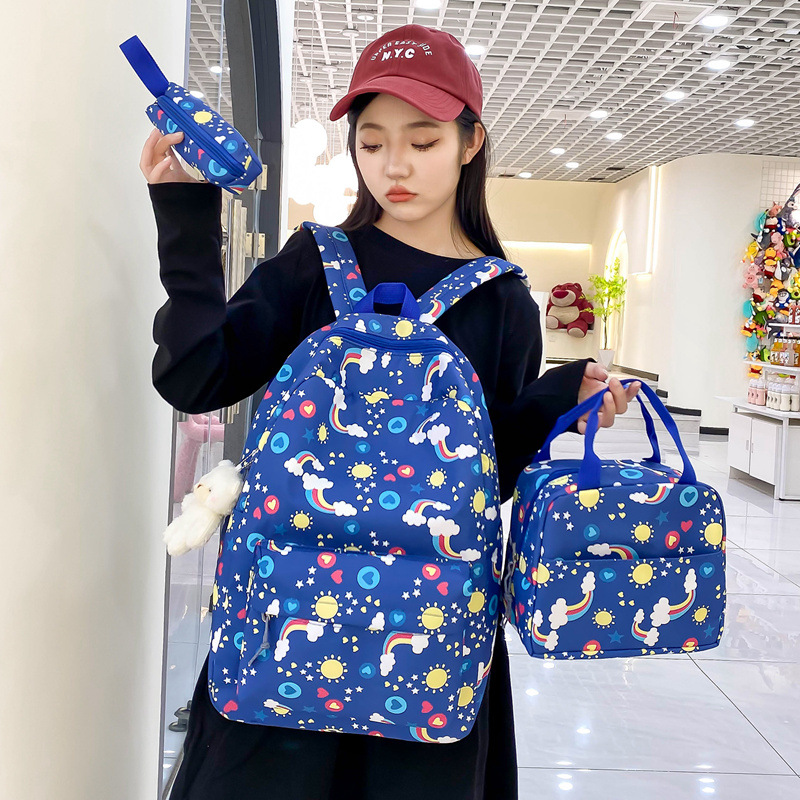 Conjunto de tres piezas de comercio exterior de mochila para estudiantes, mochila informal simple de estilo coreano, bolso para estudiantes de primaria y secundaria de gran capacidad