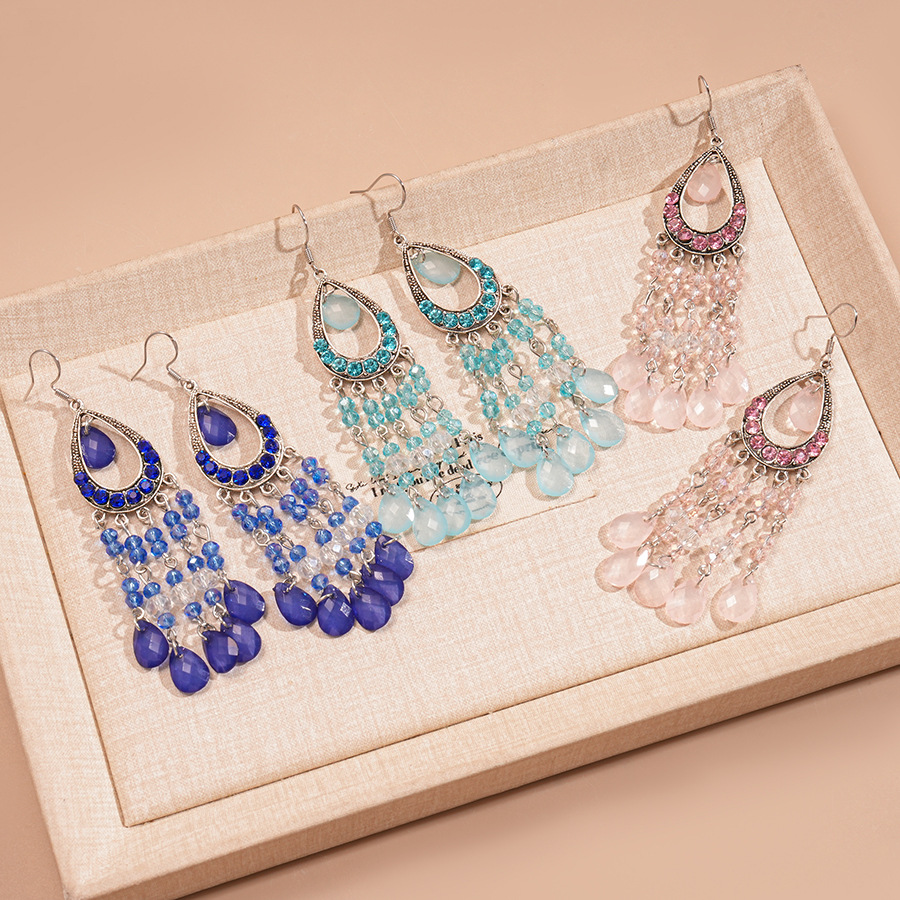 Europa y los Estados Unidos con diamantes de vidrio hueco en forma de gota de agua gancho de orejas bordado estilo nacional retro lujo ligero nicho de alta calidad pendientes para mujeres