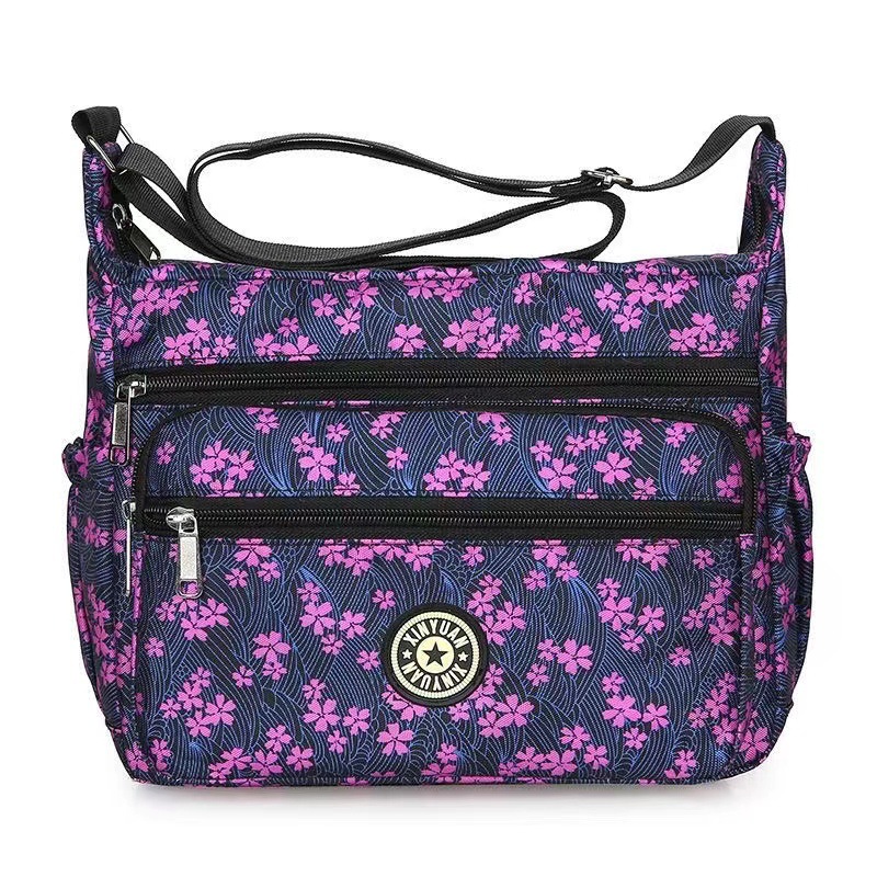 Bolsa de tela de flores bolsa de mensajero de las mujeres nueva bolsa de Madre de gran capacidad bolsa de hombro individual de mediana edad y ancianos bolsa de tela Oxford bolsa