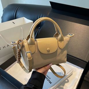 2025�¿�ţ�򲼶�ɫ��Ӱ���bags�Jƴ�������С���羳�μ�б���