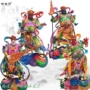 四大手持法器塑像