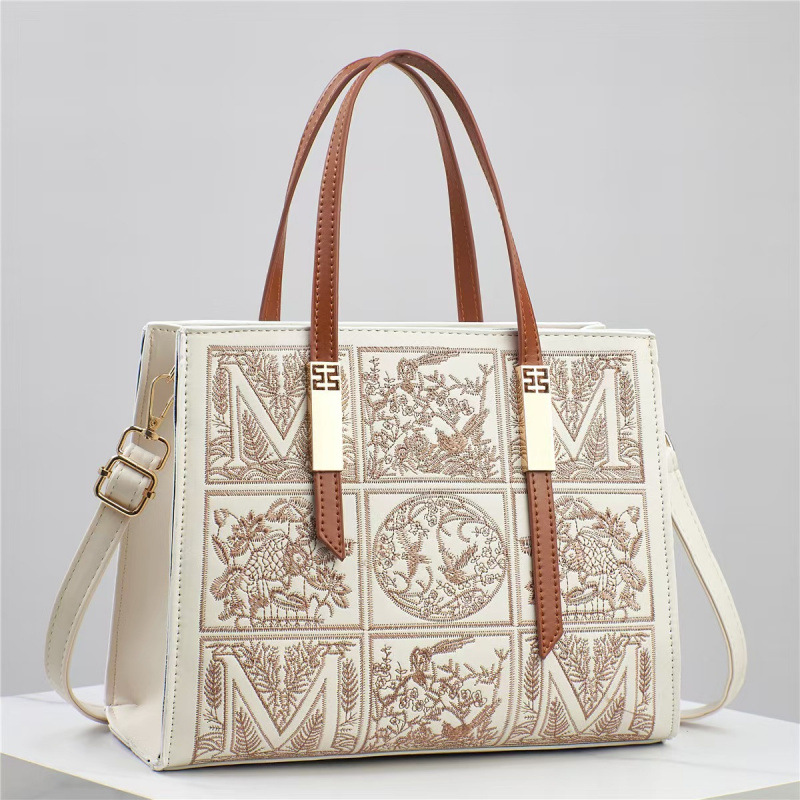 Bolsos bordados de estilo nacional, bolsos de hombro, bolsos de mochila, moda de 2025 nuevas bolsas de madres, bolsas simples
