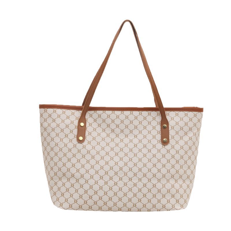 Bolsos sencillos y de moda de gran capacidad para mujer 2025 primavera nuevo bolso de moda bolso de hombro portátil de gran capacidad para viajeros