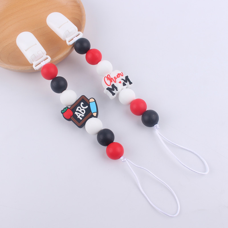 Nuevo bebé suministros chupete cadena creativa DIY dibujos animados estetoscopio pan cuerno mordedor cadena anti-gota