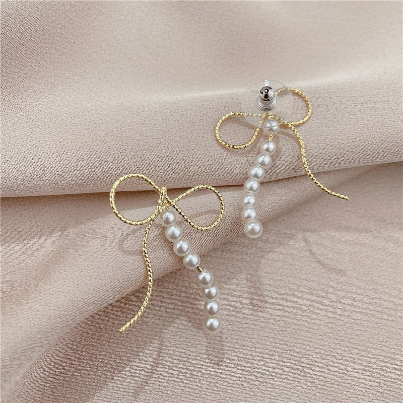 Tongfang Ornament Silver Needle Full Diamond Bow Earrings Female Temperament Long Fringe Earrings Pearl New Fashion Earrings display picture 4