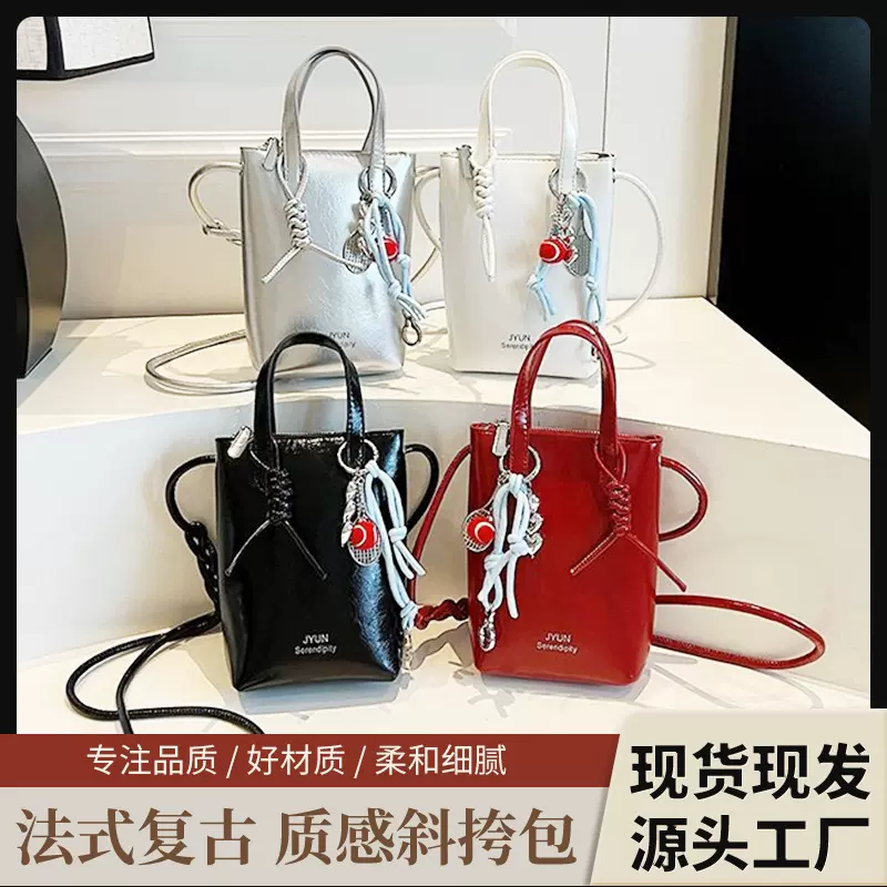 夏季新款轻便手机包女2025小众时尚手提水桶包休闲气质单肩斜挎包
