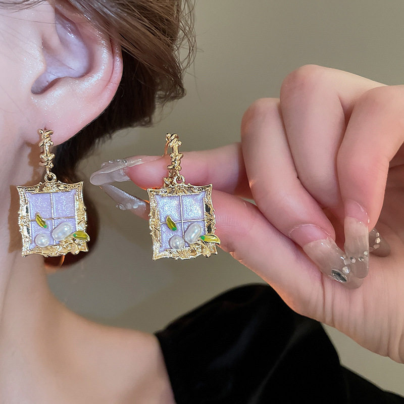 38 # Hebilla de oreja-dorado-púrpura