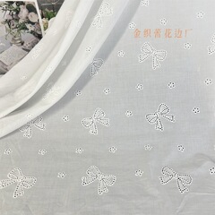 工厂现货全棉镂空刺绣面料春夏季满幅蝴蝶结绣花水溶打孔服装面料