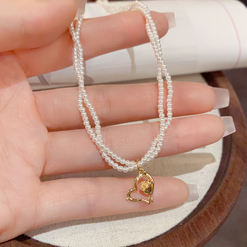 Double-layered Heart Pendant Necklace With Pearls In Gold Finish_voghion.com