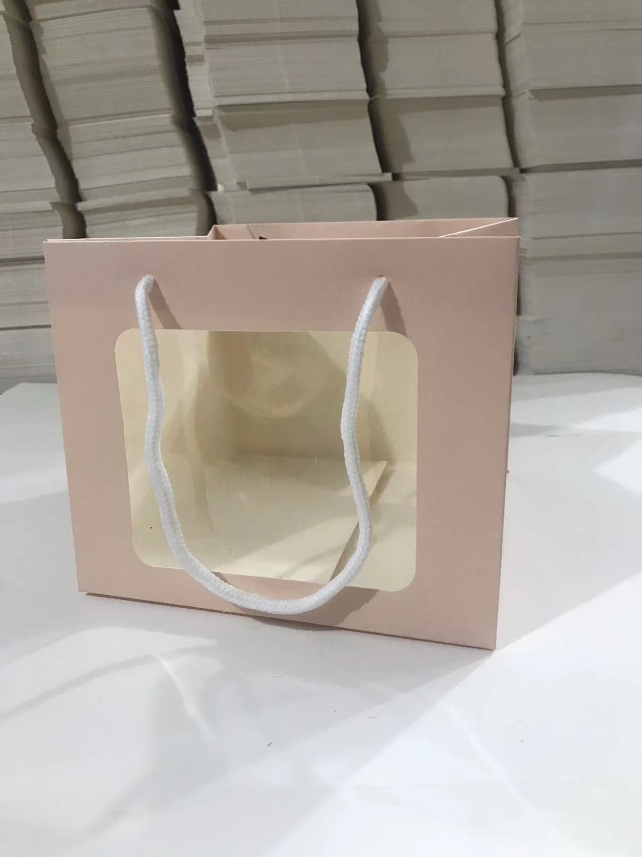 Bolso de mano con remache sonriente con ventana abierta transparente, caja de regalo de embalaje de vacaciones, joyería de juguete exquisita, bolsa de embalaje de plantas verdes al por mayor