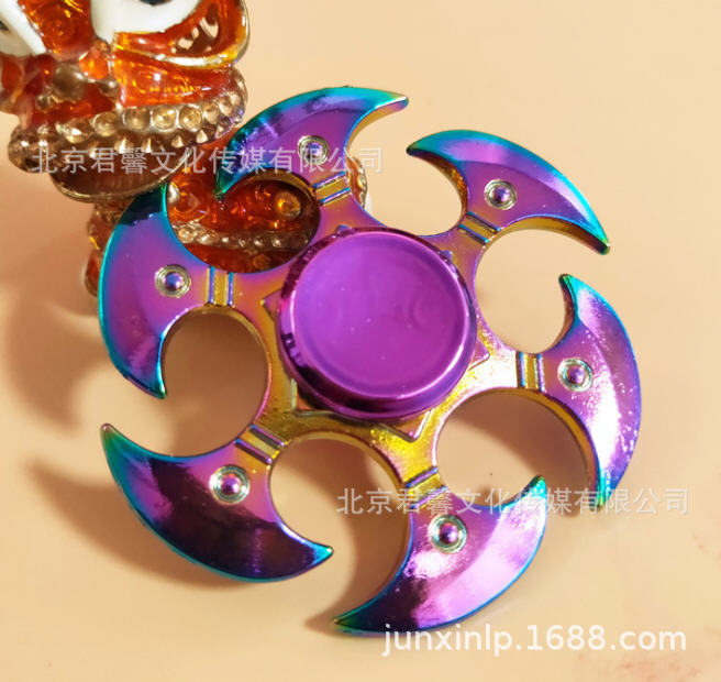 B Dedos de araña de colores, peonza, yema del dedo de metal de tres hojas, peonza de dos hojas, productos pequeños, suministro al por mayor