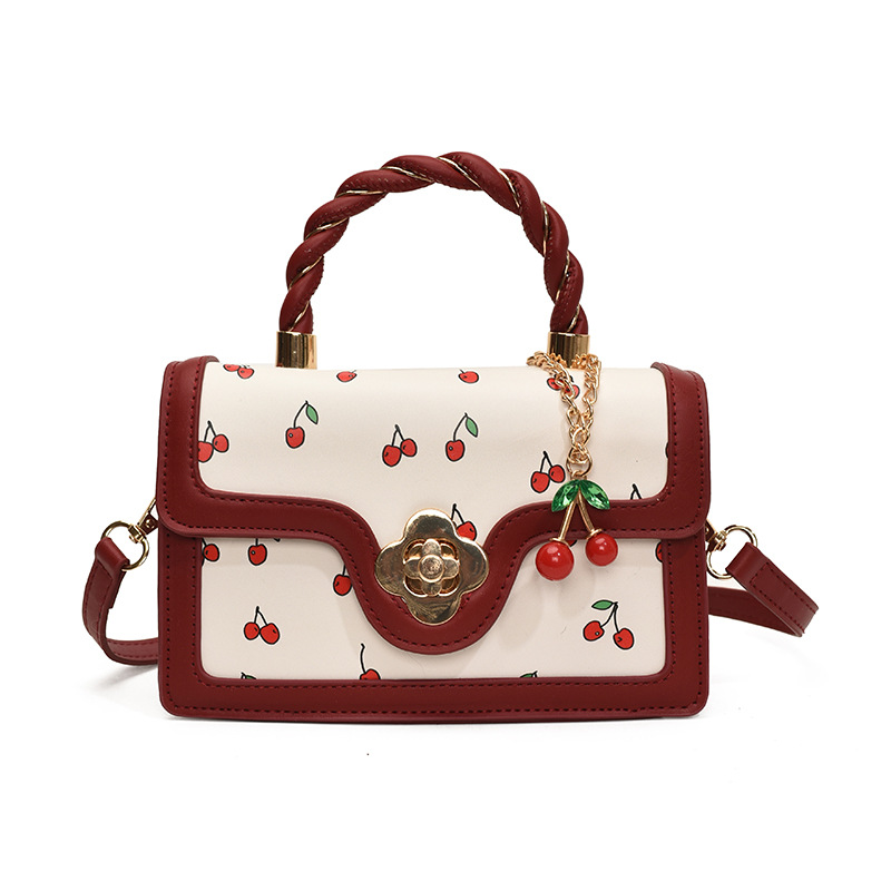 Bolso de moda coreano 2024 otoño e invierno nuevo bolso femenino lindo bolso de hombro de cereza estilo occidental color contraste bolso de mensajero marea