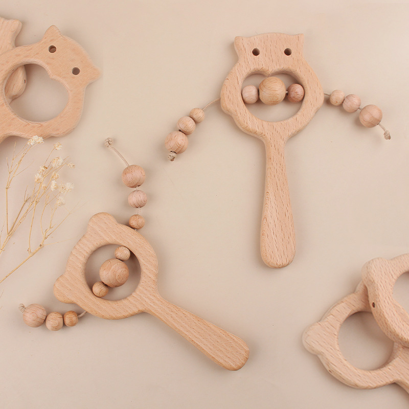 Nuevos dibujos animados DIY palo de haya juguetes de goma de diente búho oso marrón campana juguetes de goma de diente palo de molienda