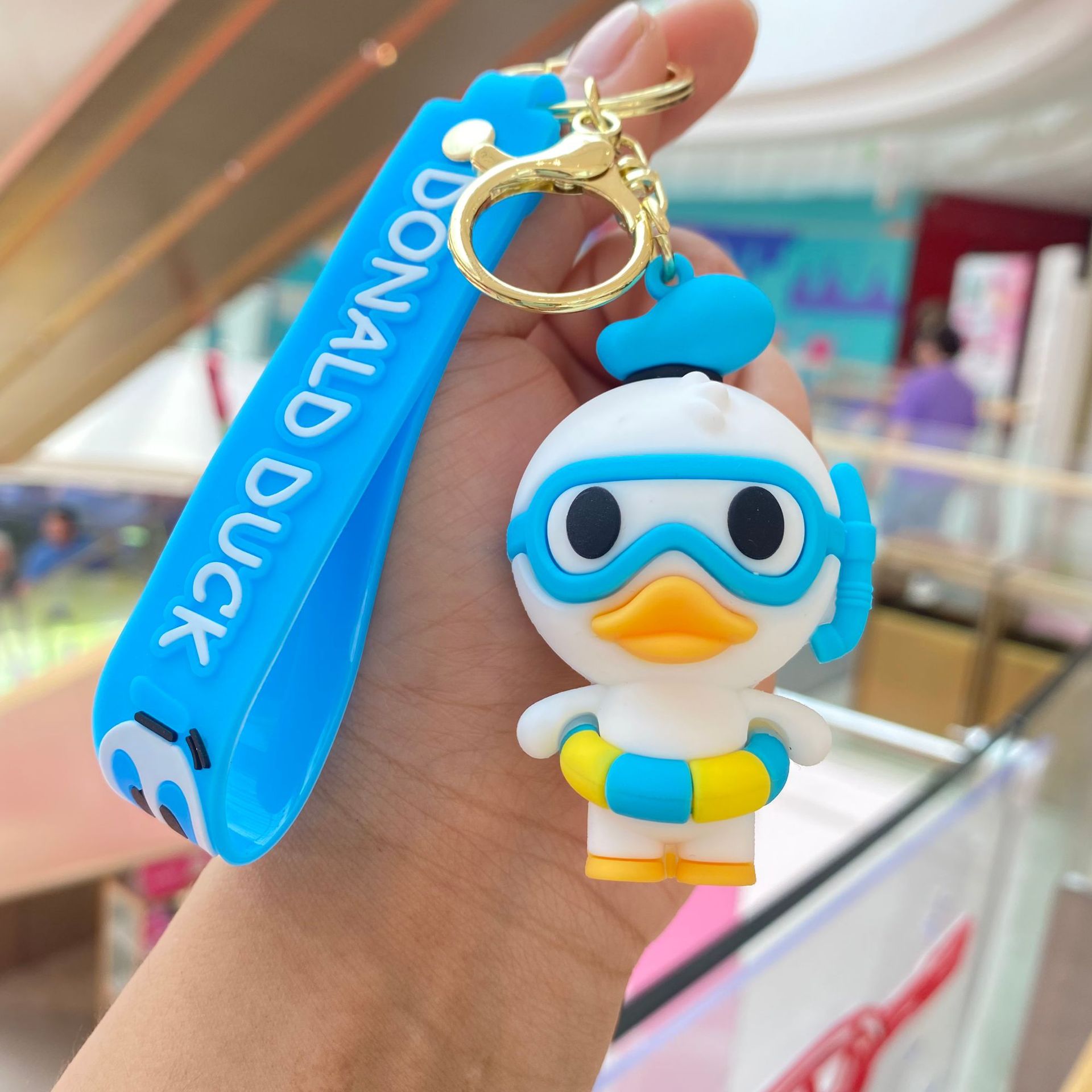 Pato donald transfronterizo llavero colgante de dibujos animados mickey mouse coche llavero bolsa muñeca máquina joyería pequeño regalo
