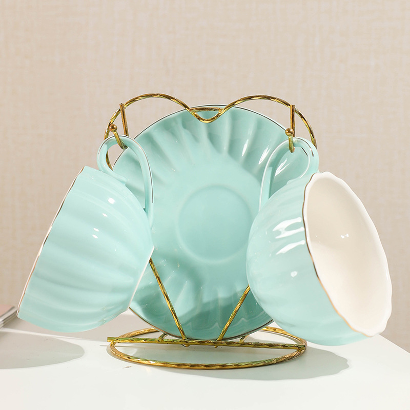 Comercio exterior de cerámica taza de café platillo juego de té regalo simple flor taza de té hogar taza de agua café traje de regalo con estante